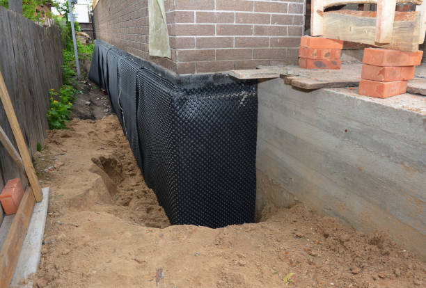 SJ Waterproofing Pros technician performing targeted Waterproofing assessment in Franklin Lakes, NJ